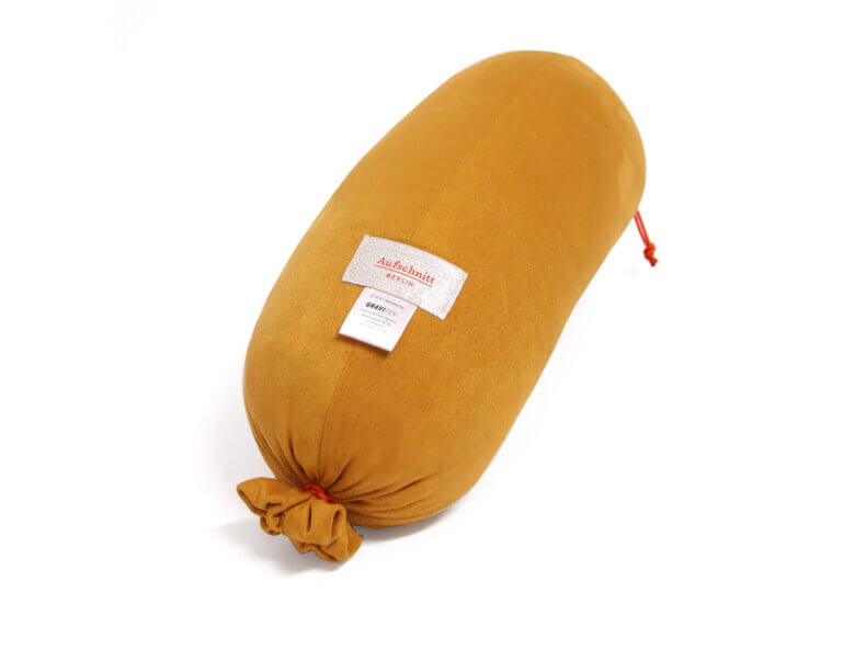 Nackenrolle „Edgar das Bockwurstkissen“